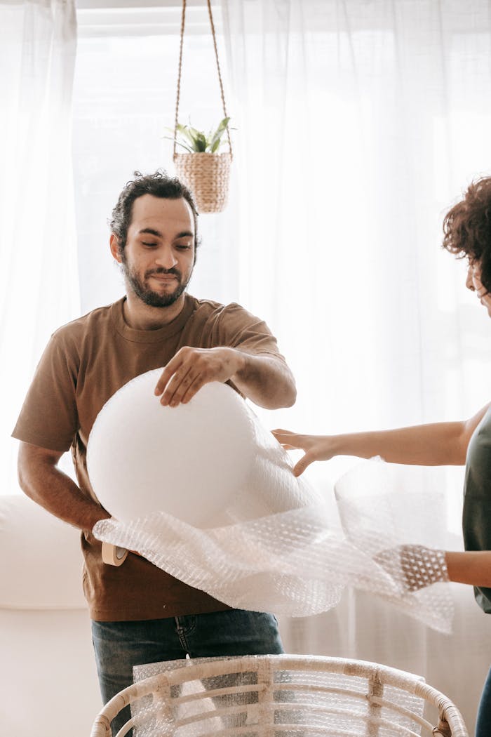 Home staging expert unpacking furniture - The Easy Stage